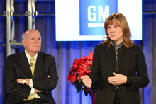 New General Motors CEO Mary Barra addresses a Town Hall meeting of employees after current Chairman and CEO Dan Akerson (left) announced he is stepping down