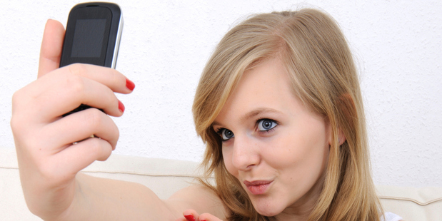 According to Oxford Dictionary a 'Selfie' is a photograph that one has taken of oneself, typically one taken with a smartphone or webcam and uploaded to a social media website.