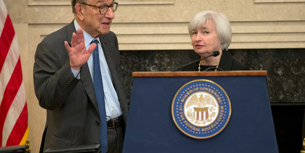 Former chairman of the Federal Reserve Alan Greenspan, left, talks with Janet Yellen, right, successor to current chairman Ben Bernanke. Photo / AP