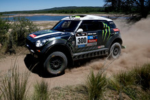 Mini driver Stephane Peterhansel and co-pilot Jean Paul Cottret, both of France, race during the first stage of the Dakar Rally between the cities of Rosario and San Luis, Argentina. Photo / AP