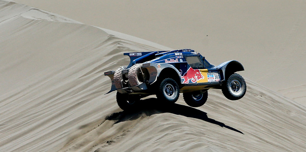 Former WRC and Dakar champion Carlos Sainz won the fourth stage of the 2014 Dakar rally. Photo / AP