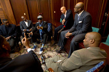 Clockwise from bottom left are Charles D. Smith, unidentified, Cliff Robinson, Dennis Rodman, Doug Christie, Vin Baker, and unidentified. Photo / AP