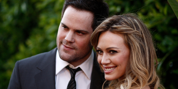 Hilary Duff and Mike Comrie pictured in May 2011. AP Photo/Matt Sayles