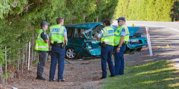 Police on the scene of the fatal crash in Havelock North. Photo/Glenn Taylor