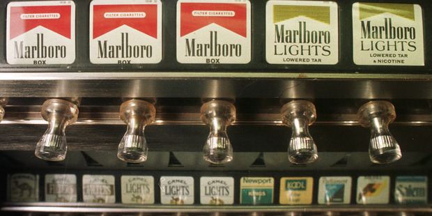 A widely read article in Reader's Digest in 1952, "Cancer by the Carton," contributed to the largest drop in cigarette consumption since the Depression. Photo / AP