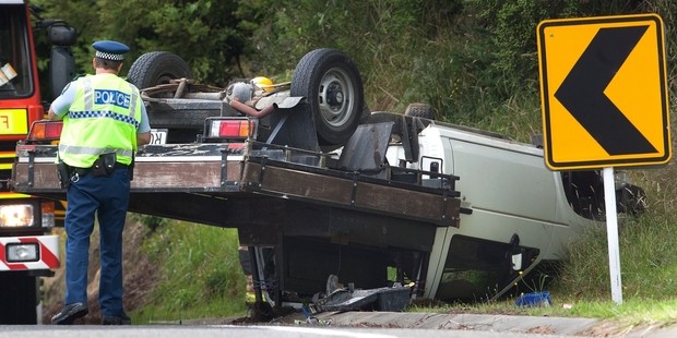 LUCKY ESCAPE: The ute after it overturned on a section of Hamurana Rd where a number of crashes have occurred. PHOTO/BEN FRASER 090114BF7