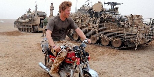 Prince Harry hams it up aboard the abandoned CG 125.