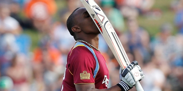 West Indies batsman Dwayne Bravo celebrates his second international ODI century. Photo / Christine Cornege