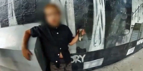 The boy was seen holding alcohol in the video.