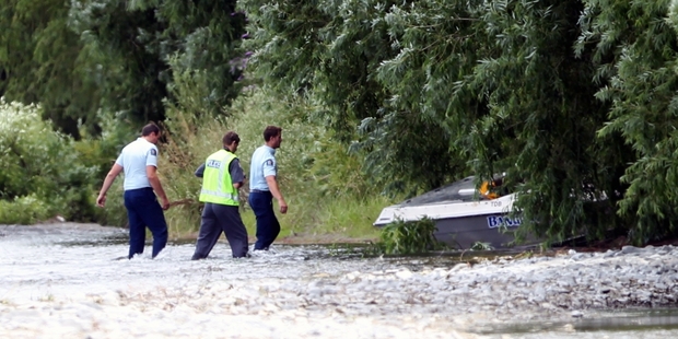 FATAL CRASH: Police at the scene of the jet-boating accident on the Ngaruroro River a week ago. PHOTO/PAUL TAYLOR HBT134162-18