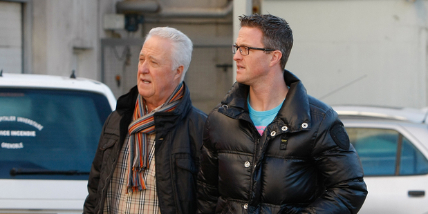 Michael Schumacher's father Rolf, left, and brother Ralf arrive at Grenoble Hospital, French Alps. Photo / AP