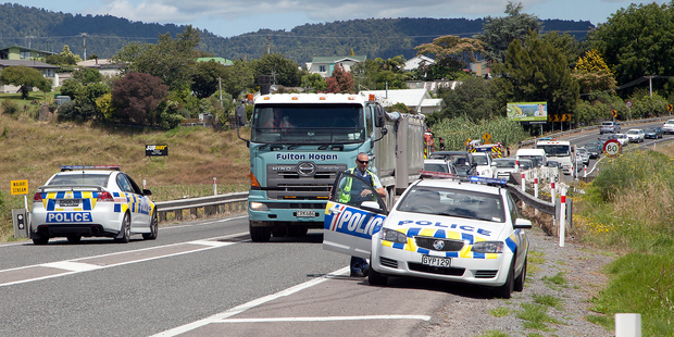 Van and trailer overturn near Te Puke.