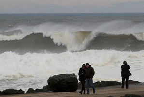 Big waves slap against the seawall at the beach in Anglet, southwestern France. Photo / AFP