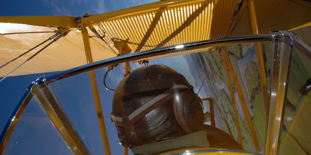 Aerobatics pilot Ryan Southam at work in a Tiger Moth over Mandeville, in Southland.