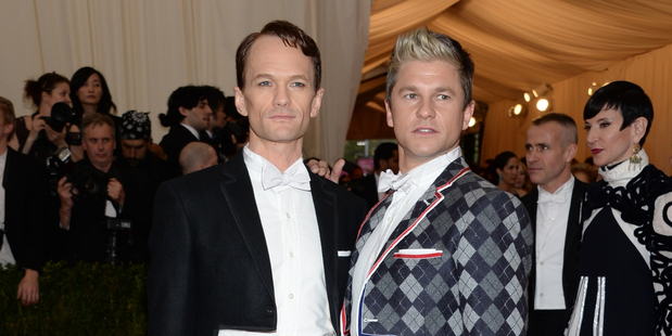 Neil Patrick Harris, left, turned down David Letterman's job because he was scared of getting bored. Photo/AP.