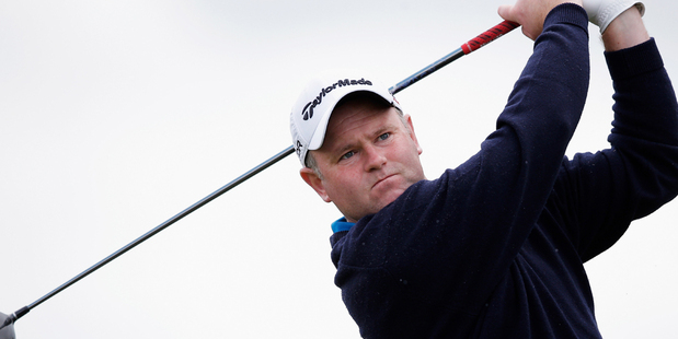 Scottish golfer Alastair Forsyth, pictured, continued his round after caddie Iain McGregor collapsed and died on the fairway. Photo / Getty Images