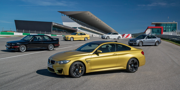 BMW M4 Coupe (front), E30 M3 (left), E36 M3, E92 M3 and E46 M3 at Portimao Autodromo.