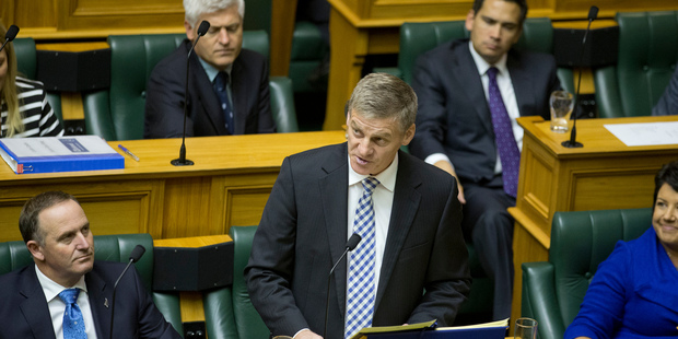 Finance Minister Bill English reading his Budget 2014 in Parliament, Wellington. 15 May 2014. Photo / Mark Mitchell