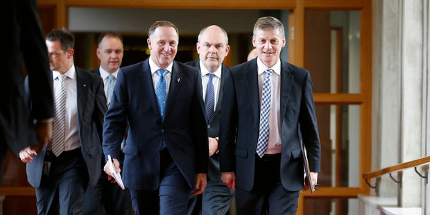 Finance Minister Bill English, with Prime Minister John Key and Associate Finance Minister Steven Joyce on the way to the House before reading his Budget 2014. Photo / Mark Mitchell