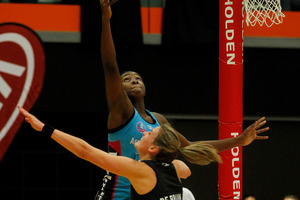 Leana De Bruin defends against Jhaniele Fowler-Reid. Photo / Christine Cornege