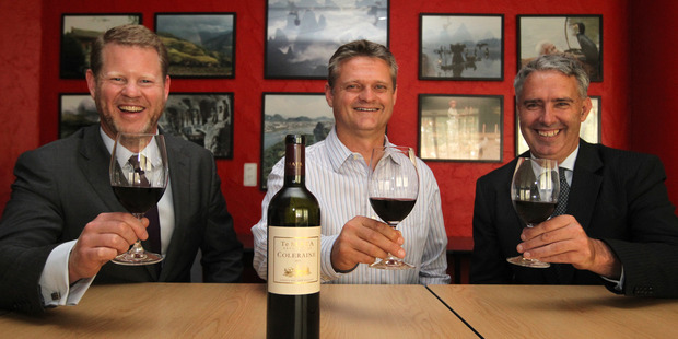 Hawke's Bay Winegrowers chairman Nicholas Buck (left), executive officer James Medina and Hastings Mayor Lawrence Yule toast the growing Chinese market. Photo/Duncan Brown