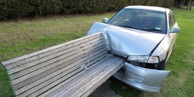 The car crashed into a Kulim Park bench on Staurday, throwing two children from the bonnet.