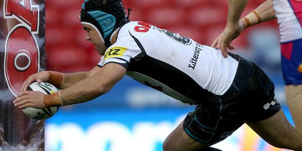 Jamie Soward of the Panthers scores a try against the Knights in his side's NRL win. Photo / Getty Images