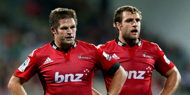 Richie McCaw and Luke Whitelock wonder what went wrong after the Sharks beat them at home with 14, and at one stage 13, men. Photo / Getty Images