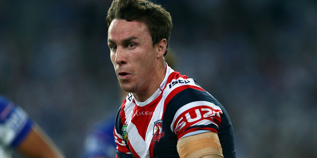 James Maloney of the Roosters goes on the attack in their 32-12 win over the Bulldogs. Photo / Getty Images.