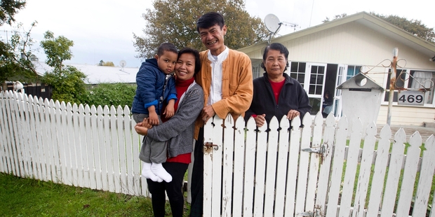 Ye Tun Oo, centre, with his son, wife and mother-in-law. Photo / NZ Herald