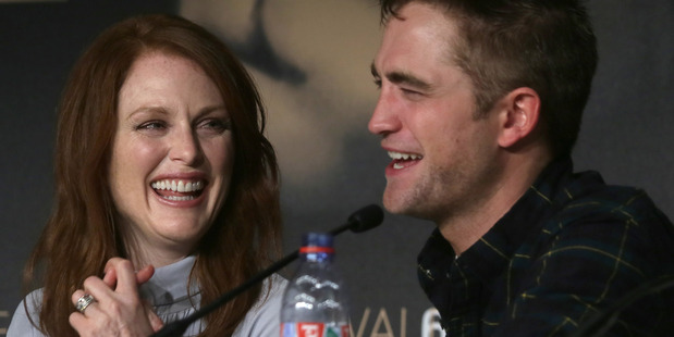 Julianne Moore and actor Rob Pattinson appear at a press conference for Maps to the Stars at Cannes. Photo/AP