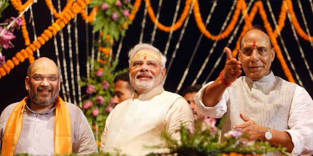 Hindu nationalist Bharatiya Janata Party leader and India's next prime minister Narendra Modi, center. Photo / AP
