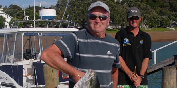 All Black coach Sir Graham Henry with a kingfish in the Bay of Islands - a place he loves spending time in.