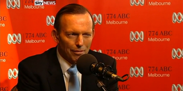 Tony Abbott winks during a radio phone-in yesterday.