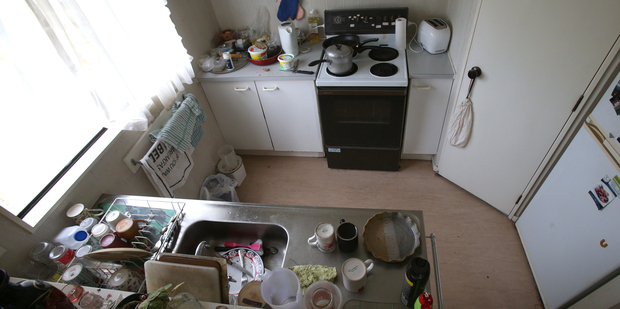 A 55-year-old woman suffered burns to her leg when she slipped, pulling her hot oven down on top of her. photo/John Borren