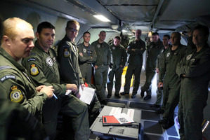 A Royal New Zealand Air Force P-3 Orion crew has a briefing prior to departing for the search area to help find the missing Malaysia Airlines Flight MH370 in Perth, Australia. Photo / AP