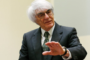 Formula One boss Bernie Ecclestone gestures as he arrives for the fifth day of his trial at the courthouse in Munich, southern Germany. Ecclestone is charged with bribery and incitement to breach of trust "in an especially grave case" over a US dollar 44 million payment to a German banker. Photo / AP