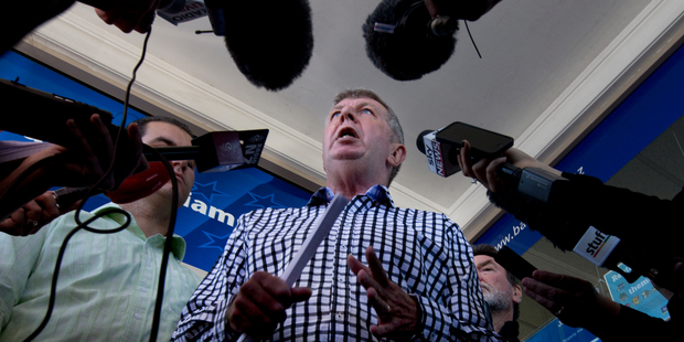 National Party MP Maurice Williamson talks to media outside his office in Pakuranga, after resigning as a minister. Details of new contact he had with police have been revealed. Photo / NZ Herald