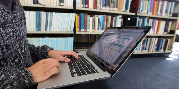 Many students in the university's main library yesterday had a laptop rather than a pile of books. Photo / Jason Oxenham