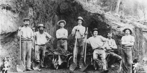 A gang of construction workers somewhere in Taranaki in the days when roads were made the hard way. NZ Herald Archive