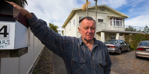Trevor Gregory at the disputed Pt Chevalier house. Photo / Peter Meecham