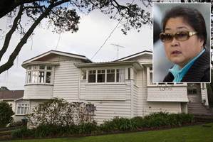 The house at 21 Maungakiekie Ave, Greenlane Auckland, owned by the Cornwall Park Trust Board. Inset: Yong Xin Chen. Photo / Greg Bowker