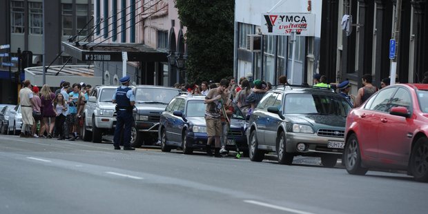 Police attend a large party on Stafford Street. Photo / Otago Daily Times