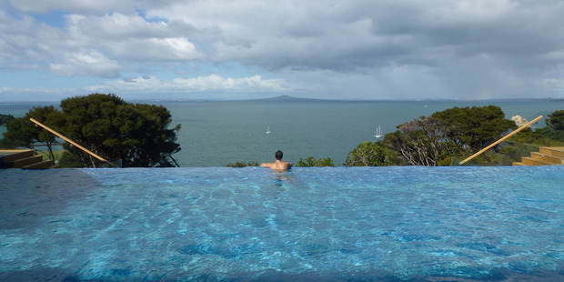 The house's infinity pool, with a view out to Rangitoto Island. Photo / Justine Tyerman