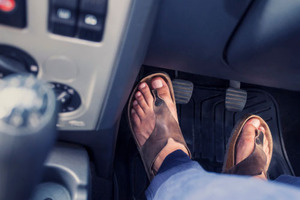 A woman died after a driver's jandal got stuck, causing them to reverse suddenly into her. Photo / Getty Images