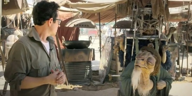 Star Wars director JJ Abrams with one of the new creatures in the film.