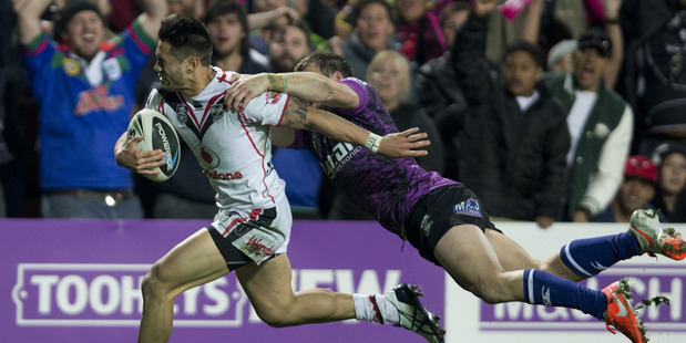Shaun Johnson is denied a last minute try by the tackle of Josh Morris. Photo / Brett Phibbs