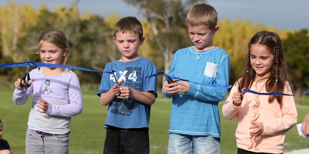 Isabella Cochrane, Dylan Avison, Finn Reiher and Neve Reiher cut the ribbon. Photo/Michael Cunningham