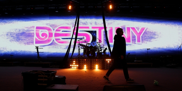 The auditorium of the new 'City Of God' Destiny Church and Stan Walker. Photo / Chris Gorman