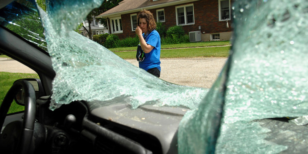 The broken windscreen of Heidi Conner's minivan. Photo / AP